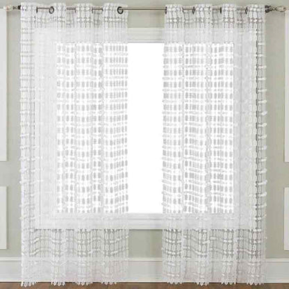 White Amelia Macrame Lace Grommet Top Panel hanging on a decorative curtain rod 