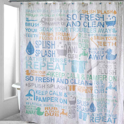 Multi Bath Words Fabric Shower Curtain hanging on a bathroom curtain rod