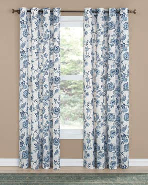 Denim Colette Printed Grommet Top Panel hanging on a decorative curtain rod