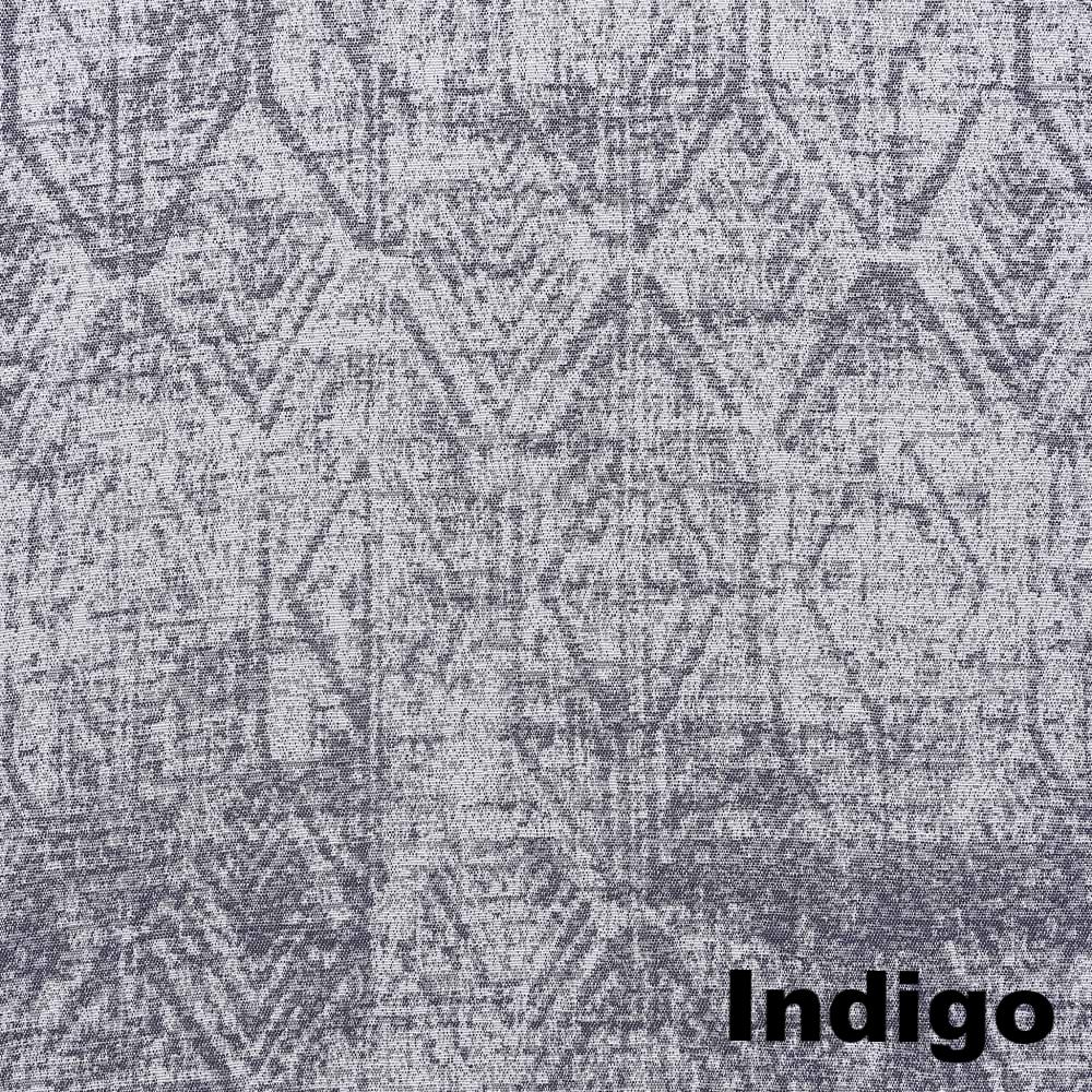 Up close shot of Indigo Sun Zero Darren Distressed Damask Blackout Grommet Top Panel fabric