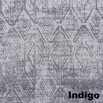 Up close shot of Indigo Sun Zero Darren Distressed Damask Blackout Grommet Top Panel fabric
