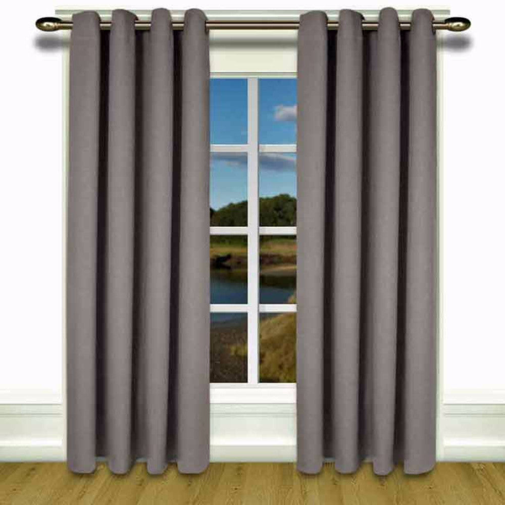 Grey Glasgow Grommet Top Panel hanging on a decorative curtain rod