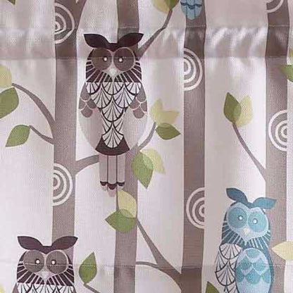 Closeup of No. 918 Hoot Owl Print Kitchen Valance hanging on a curtain rod fabric