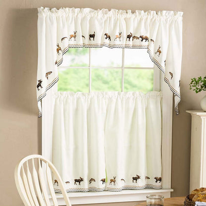 Lodge Embroidered Kitchen Valance, Swags, and Tier Curtains hanging on curtain rods