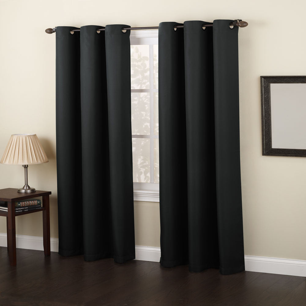 Black No. 918 Montego Grommet Top Textured Panel hanging on a decorative curtain rod