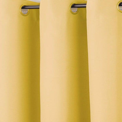 up close shot of Yellow No. 918 Montego Grommet Top Textured Panel fabric and grommets