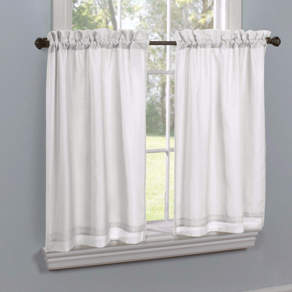 White Rhapsody Lined Thermavoile Tailored Kitchen Tier Curtains hanging on decorative rods
