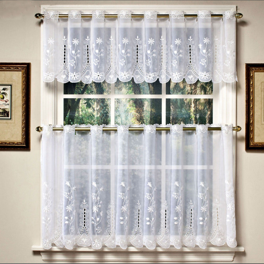 White Samantha Embroidered Sheer Kitchen Valance and Tier Curtains hanging on a curtain rod