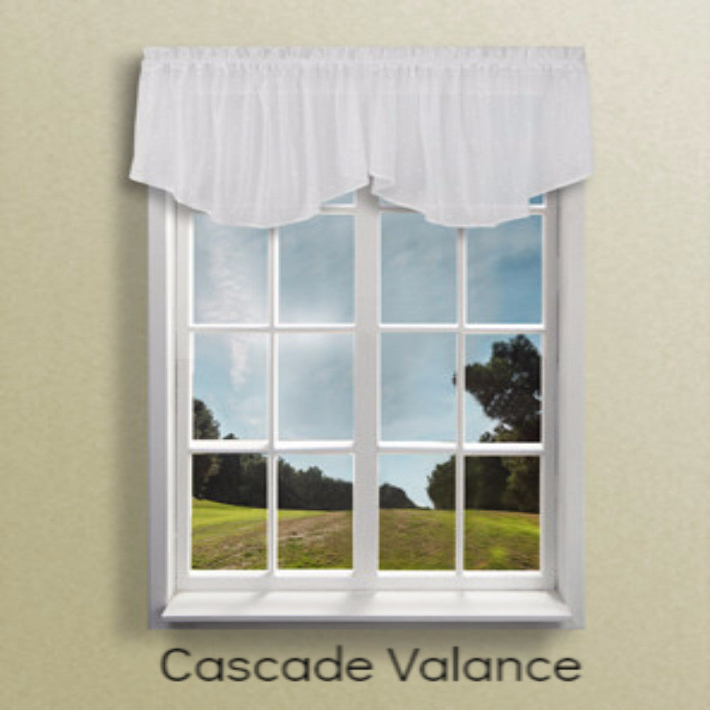 Ricardo Sea Glass Swag Curtains and Valance hanging on a curtain rod