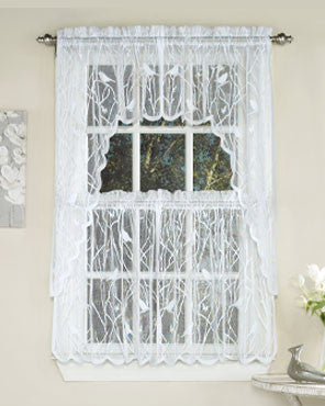 White Songbird Lace Kitchen Valance, Swags, and Tier Curtains hanging on curtain rods