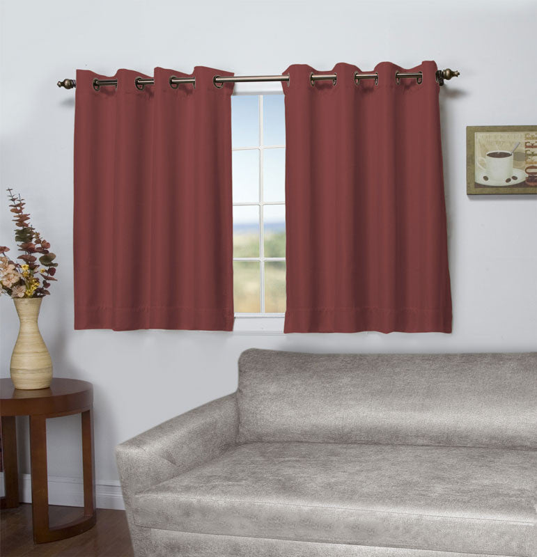 Floral Rose Tacoma Double Blackout Shortie Grommet Top Panels hanging on a decorative curtain rod