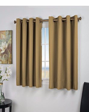 Sand Ultimate Blackout Grommet Top Shortie Panels hanging on a decorative curtain rod 