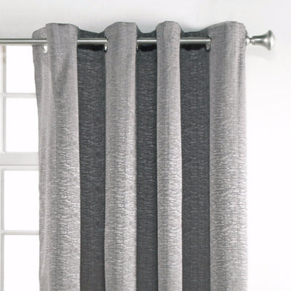 Closeup of grey Portland Room Darkening Grommet Top Panel fabric and grommets